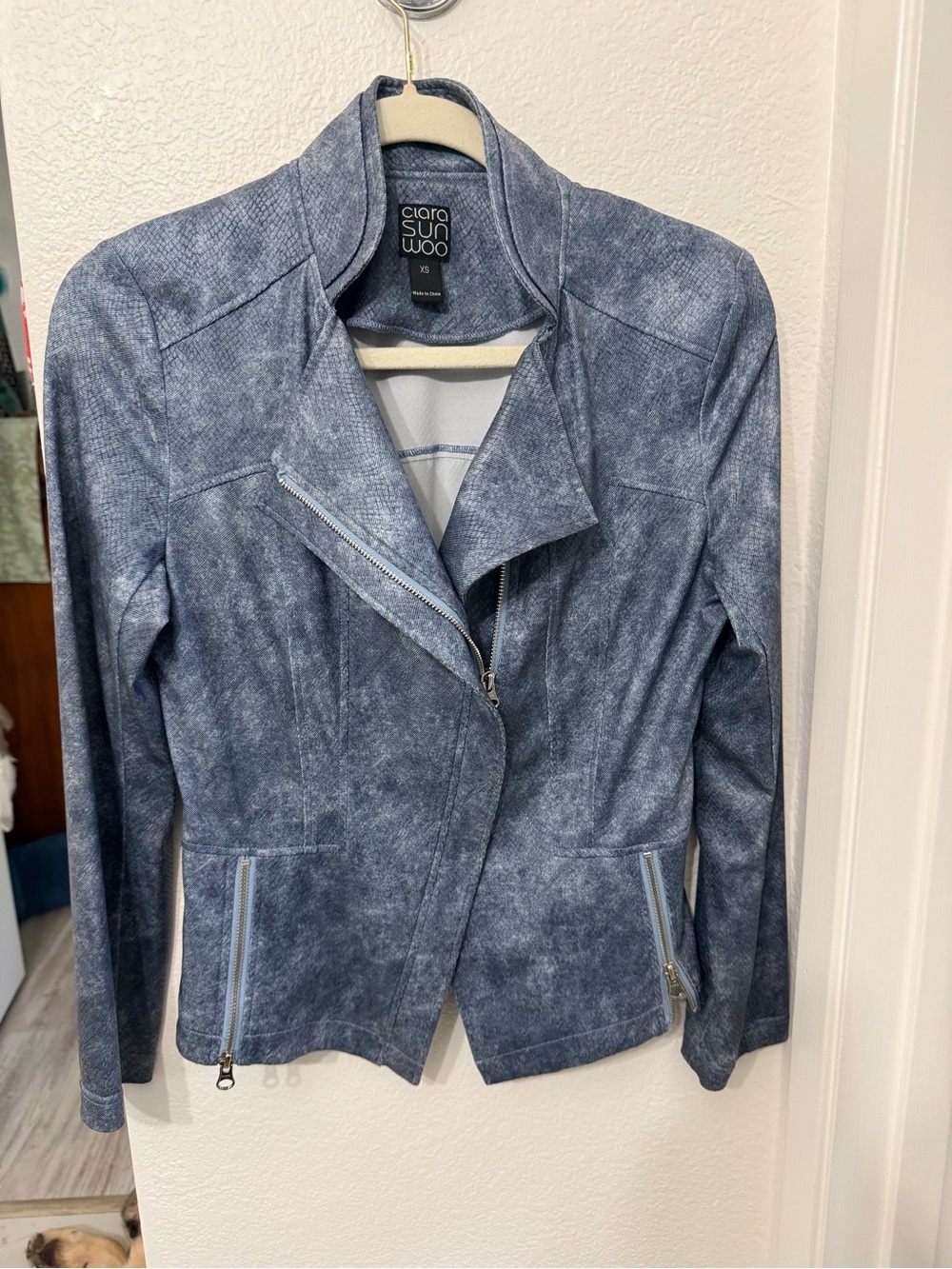 CLARA SUNWOO Women's
Liquid Leather Moto Jacket w/ washed denim blue finish.